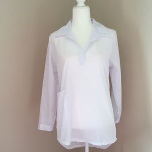 Very sheer long white sleeved blouse with pocket